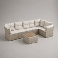 Set divano angolare da esterno a 5 posti in polyrattan beige con cuscini crema e tavolino in legno, 260 x 190 x 72 cm